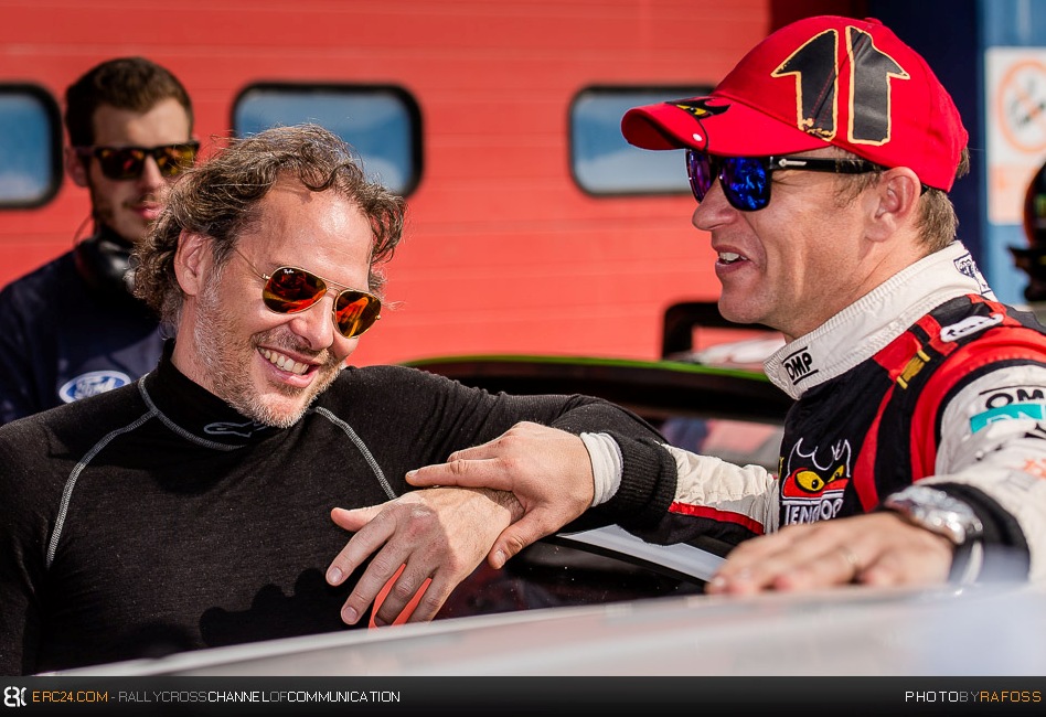 Three FIA World titles: 1997 F1 champion Villeneuve, 2003 WRC and 2014 WRX winner Petter Solberg chatting in Italy. © JKR/ERC24